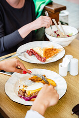 friends eating in the cafe