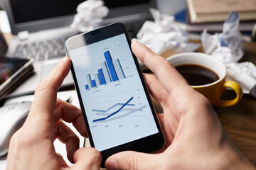 business concept - smartphone in the office