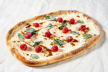 sweet pizza with raspberries and caramel