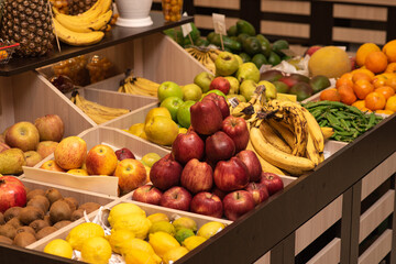 A counter with juicy and delicious fruits. With lots of wholesome food