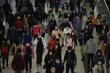 masked metro crowd in hong kong