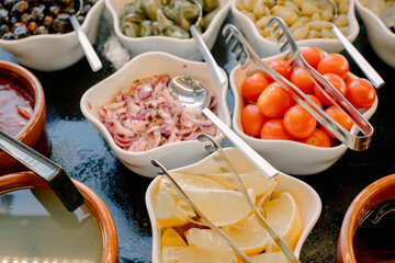 Healthy food concept. Variety of vegetables salad bowls. top view, border. Salad bar. Take away Diet lunch ideas