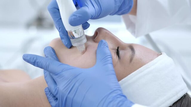 Close-up 4K video of woman enjoying beauty treatment in professional salon