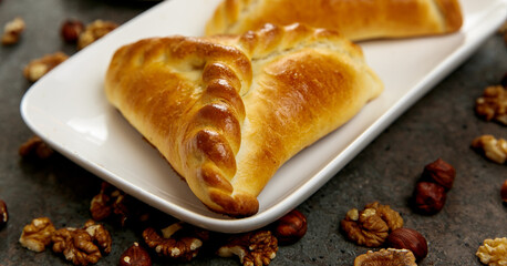 Fresh aromatic pastries for breakfast or snack. 
Meat pies. Eastern samsa