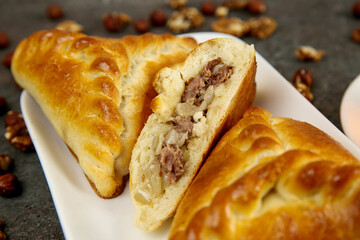 Fresh aromatic pastries for breakfast or snack. 
Meat pies. Eastern samsa
