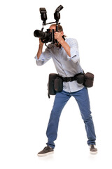 Fototapeta na wymiar Full portrait of male journalist working with digital professional camera
