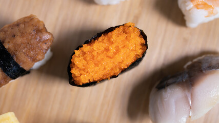 Japanese food and top view concept.  Different kinds of sushi on plate