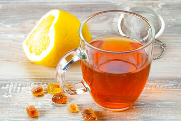 cup of hot tea on wooden table