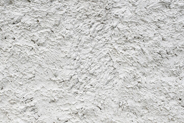 Fine white texture of construction plaster on the wall.