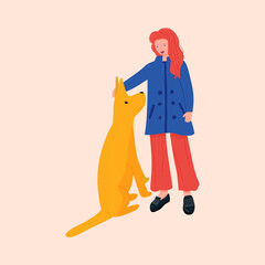 Teenage girl volunteering in animal shelter with dog.