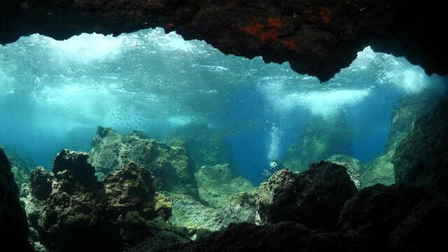 underwater caves and tunnels with nice lightning  sun rays and sun beams relaxing ocean scenery backgrounds