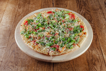 fresh pizza on a wooden background