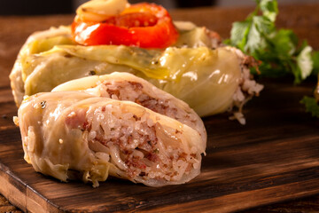 Arabic food. Appetizing cabbage rolls on wood background