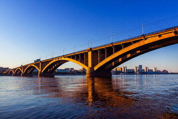 Fototapeta na wymiar Krasnoyarsk, Russia, communal bridge over the Yenisei
