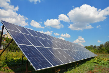 Ground and pole mounted residential solar panel, renewable energy system installed in the vegetable...