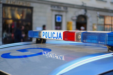 Police car lights, Krakow, Poland   © Travel Photos