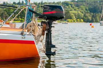 Ship propeller. Outboard engine. Yacht on the lake.
