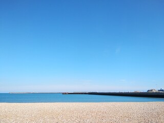 Beach and sea with pier