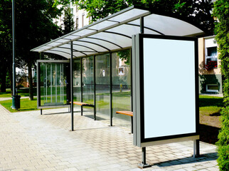 bus shelter. blank white advertising billboard and ad sign. background image for mock-up. empty exterior place holder. buststop. transit stop. 