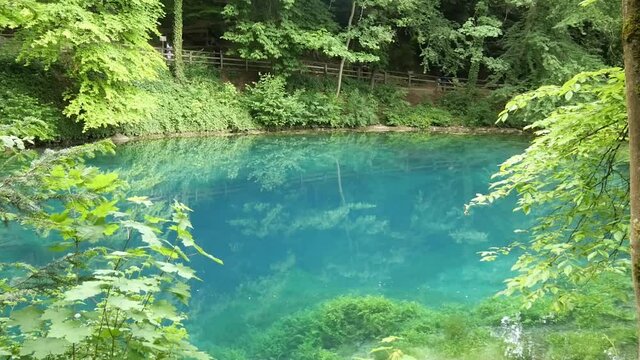 View on the Blautopf Lake in Blaubeuren, Swabian Alb, Germany