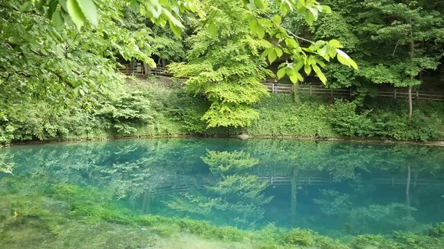 View on the Blautopf Lake in Blaubeuren, Swabian Alb, Germany