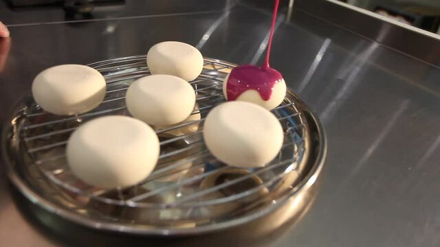 Cake making process. Glazing a cake. Making it Glossing