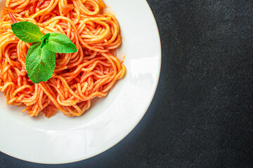 spaghetti pasta tomato sauce
Menu concept serving size second course. food background top view copy...