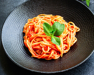 spaghetti pasta tomato sauce
Menu concept serving size second course. food background top view copy...
