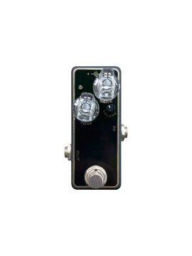 Isolated mini boutique black and clear knob vintage overdrive stomp box pedal electric guitar effect on white background with clipping path. equipment for making music in a studio.