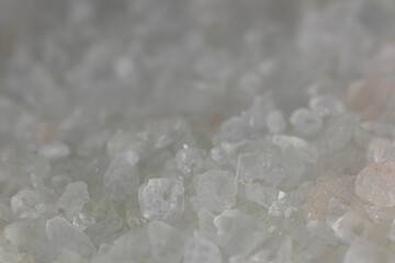 Fototapeta na wymiar Close-up of thick crystals of white Himalayan salt. coarse-grained rock salt background.