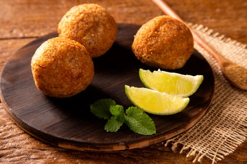 Potato Kibbeh - Middle Eastern minced dry curd wheat fried snack made with potato. Also popular party dish in Brazil (kibe)