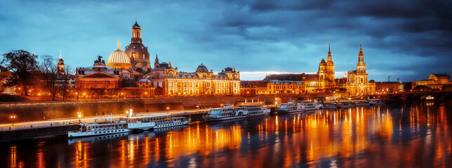 Fototapeta na wymiar Incredible panorimic Cityscape with reflection. Dresden during sunset. Wonderful View on old historical town with reflection in Elbe river Dresden, Saxony, Germany Wonderful Picturesque Scene