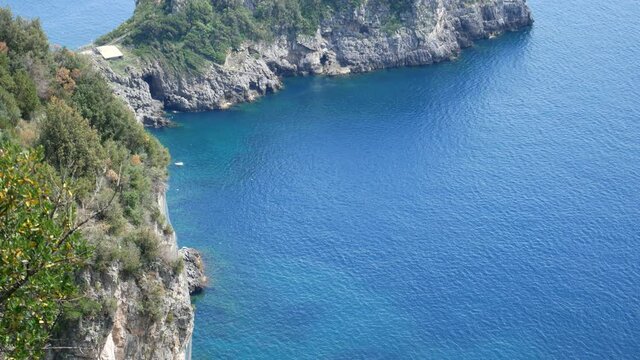 Promontory and tower of Capo di Conca in the municipality of Conca dei Marini. Coastal tower on the mediterranean sea. Amalfi Coast, Salerno, Campania, Italy