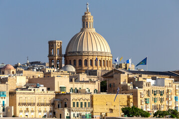 Fototapeta na wymiar Valletta. The building of the Cathedral of St. Paul on a sunny day.