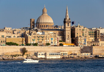 Fototapeta na wymiar Valletta. The building of the Cathedral of St. Paul on a sunny day.