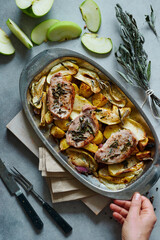 Grilled pork with potatoes, with hand