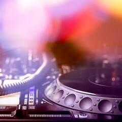 dj equipment in blurred background