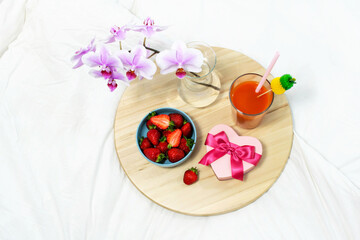 Breakfast in bed flat lay. Morning surprise birthday, romantic gift. Beautiful love, proposal concept. Lazy holiday, cozy room service, hotel compliment. Tray with food. Eating in bedroom lifestyle