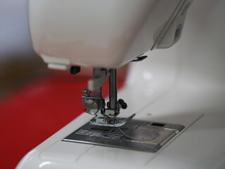 Closeup sewing machine accessories equipment 