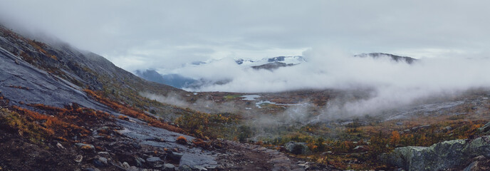 Road in fog to trolltunga, Norway. Mountains.