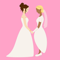 Couple of lesbian brides holding hands at the wedding