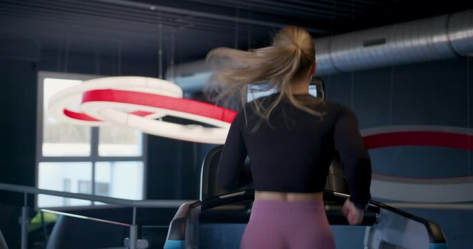 Woman running on a Treadmill