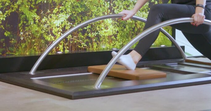 Stretching legs of a woman