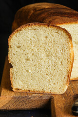 bread white golden fresh wheat baking. food background top view copy space for text