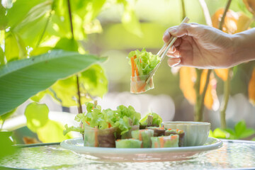 Thai fresh spring roll or  Fresh Vegetable Rice Wraps is the vegetable inside the roll. Eat with specific sauce beside it.