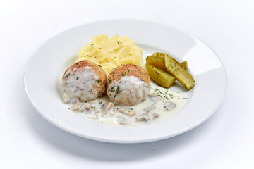 meatballs with mashed potato and sauce