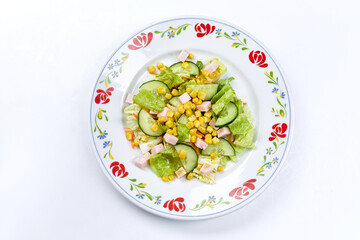 salad with ham on the white background