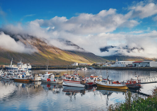 Bolungarvik, Iceland / Iceland - september 2018: Fishing boats in the harbor of Bolungarvik, Iceland.