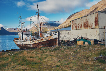 Old abandoned ship on the shore. Iceland.