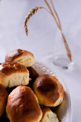 Homemade pies on white plate standing on the white  linen background